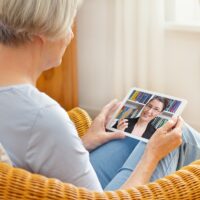 teletherapy senior woman tablet computer