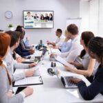Businesspeople Having Video Conference In Boardroom Businesspeople Having Video Conference In Boardroom
