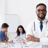 African Medical Doctor Looking At Camera During Conference African Medical Doctor Looking At Camera During Conference