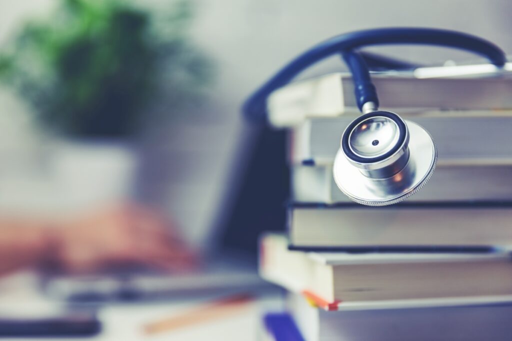 medical school student studying in the library