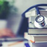 medical school student studying in the library