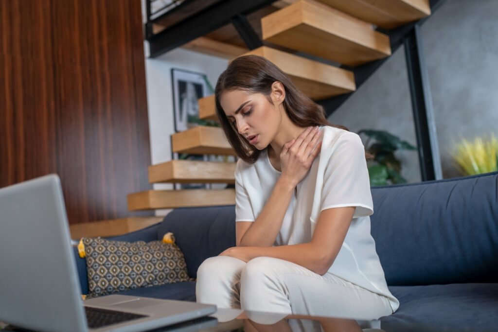 Frustrated woman getting a psychological support remotely