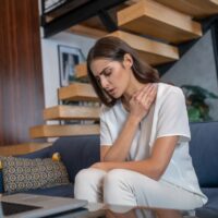 Frustrated woman getting a psychological support remotely