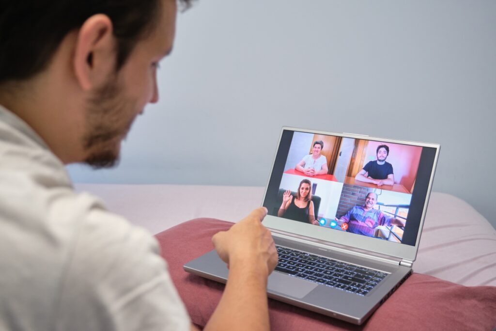 Man pointing at a person on a videocall therapy session. Distance therapy concept.