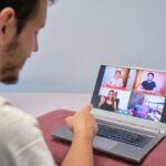 Man pointing at a person on a videocall therapy session. Distance therapy concept. Man pointing at a person on a videocall therapy session. Distance therapy concept.