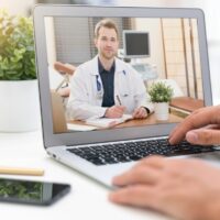 Doctor with a stethoscope. Telemedicine concept